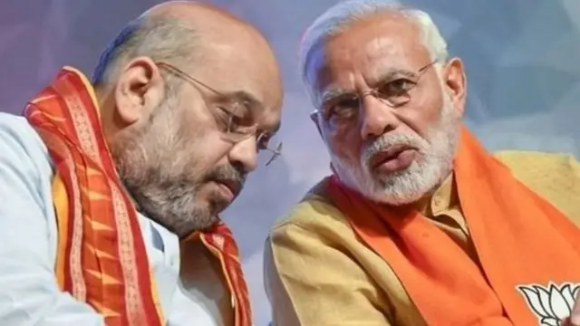 અમિત શાહ તથા નરેન્દ્ર મોદીની તસવીર