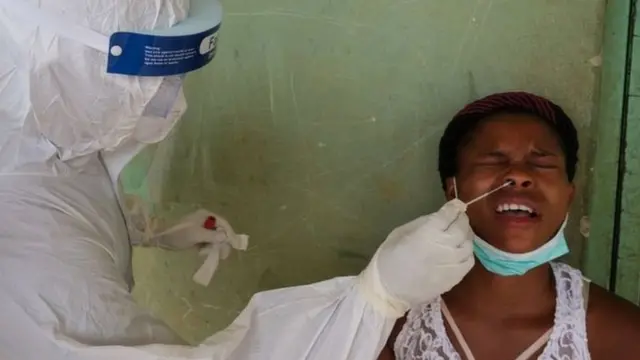 Covid-19 testing on a woman