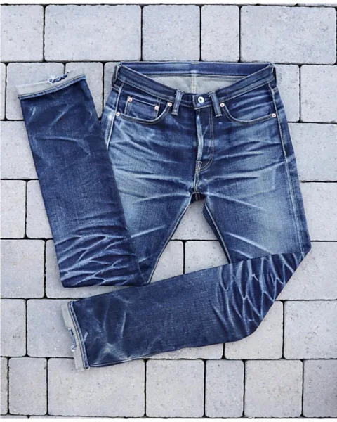 Indigo Invitational Images of well-worn jeans are entered into the Indigo Invitational competition, where contestants wear a pair of denims for one year (Credit: Indigo Invitational)