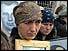 Beslan relatives holding pictures 