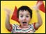 Toddler waving and smiling