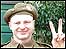 man giving 'v' for victory sign, haworth, 2006