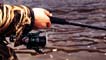 hand holding fishing rod