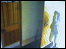 CCTV footage of a girl coming through a door