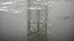 Another photograph of the crane peaking through the ice, 8 January 2010