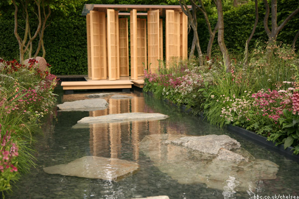 Pool leading to bamboo pavilion by Kengo Kuma