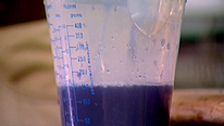 The vibrant purple liquid in a pouring jug