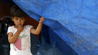 Niña siria en un campo de refugiados