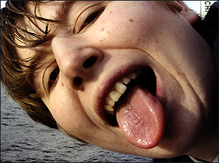 Julie McDonald sticks out her tongue to the camera