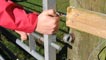 Hand closing rural gate