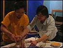 Women from the Visibly Proud film sharing food